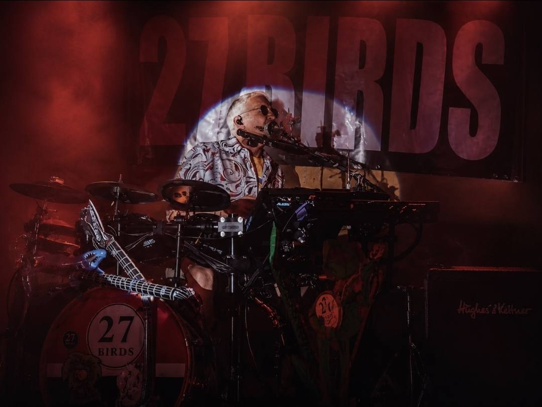 James performing behind the 27 Birds drum kit
